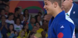 Alex Bologa (20 de ani) a fost ridicat în brațe de învinsul său în meciul pentru medalia de bronz la Jocurile Paralimpice (Youtube - Paralympic Games)