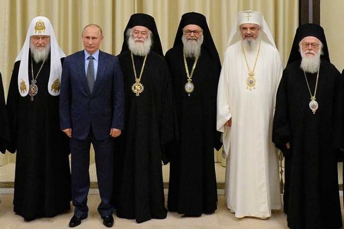 vladimir putin patriarhul daniel