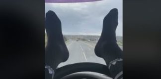 Șofer condamnat la închisoare după ce s-a filmat în timp ce conducea cu picioarele șofer picioare volan