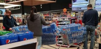 Primul hypermarket din România amendat pentru că nu a respectat regula certificatului verde speculă spirt