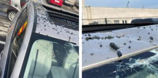 Mașină parcată neregulamentar, distrusă de angajații Domeniului Public. „Au scăpat-o de pe platformă” mașină scăpată platformă cluj