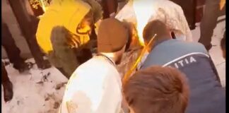 Un preot ortodox s-a întins pe jos în poarta cimitirului ca să blocheze o înmormântare penticostală preot suceava